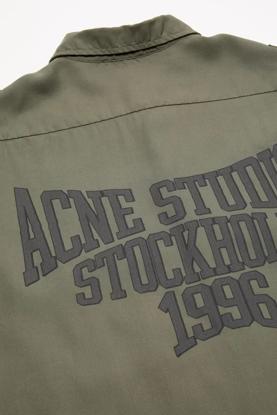 Button-up shirt with logo