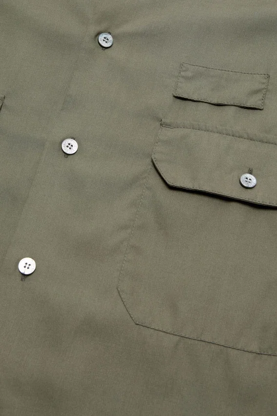 Button-up shirt with logo