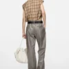Coated pinstripe trousers