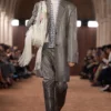 Coated pinstripe trousers