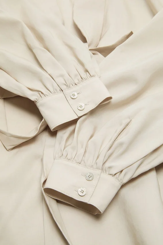 Cut-out blouse with bow
