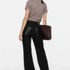 Denim trousers with leather patches