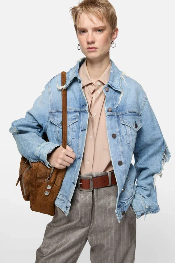 Distressed denim jacket