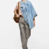 Distressed denim jacket