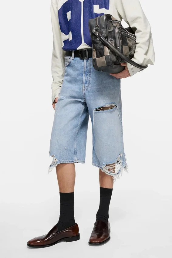 Distressed denim shorts