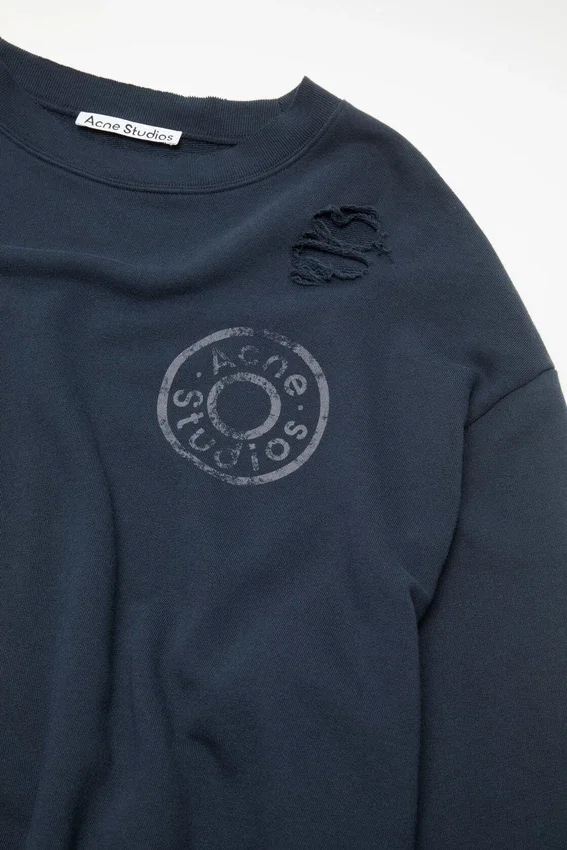 Distressed fleece sweatshirt