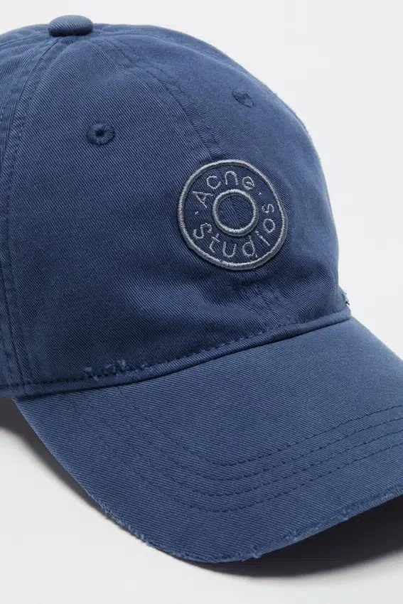 Distressed logo cap