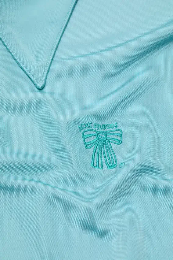 Embroidered bow logo button-up