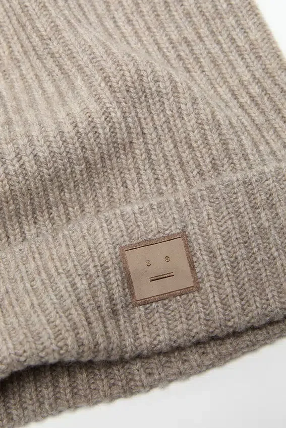Face logo square beanie