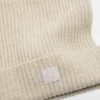 Face logo square beanie