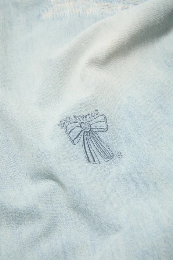 Mended denim shirt