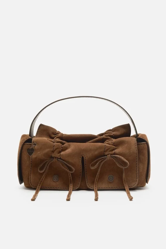 Multipocket suede shoulder bag