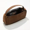 Multipocket suede shoulder bag