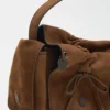 Multipocket suede shoulder bag