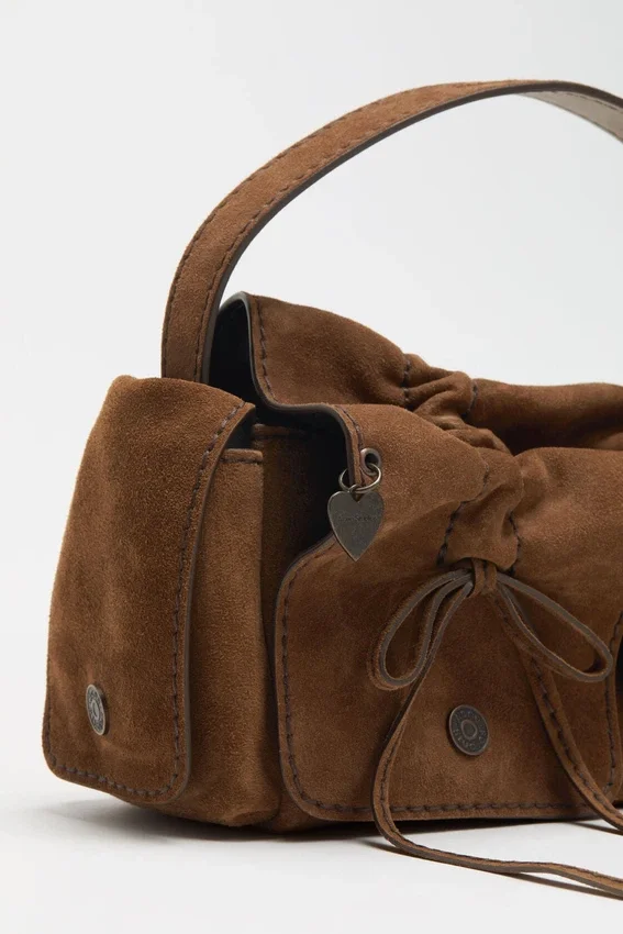 Multipocket suede shoulder bag