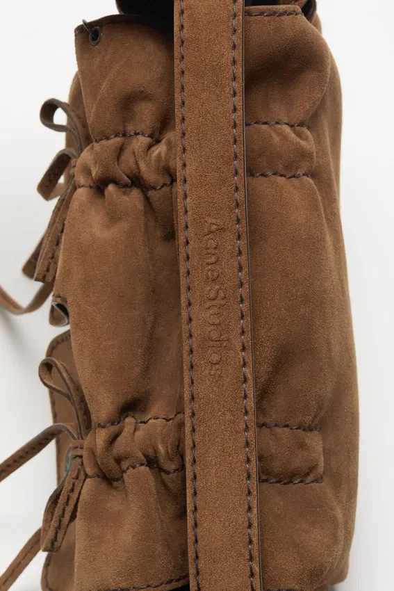 Multipocket suede shoulder bag