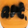 Sprayed graphic cap