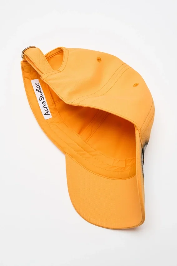 Sprayed graphic cap