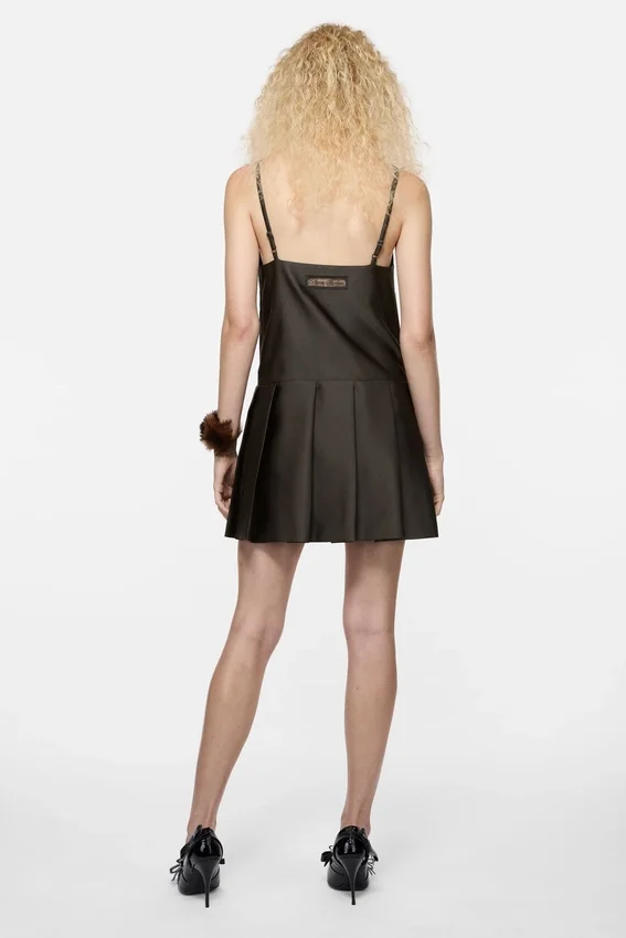 Strap dress with pleated skirt