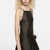 Strap dress with pleated skirt