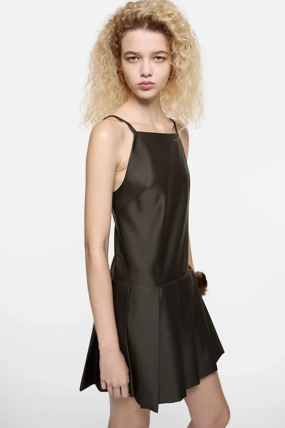 Strap dress with pleated skirt