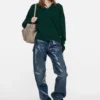 Wool sweater with cut-out