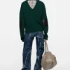 Wool sweater with cut-out