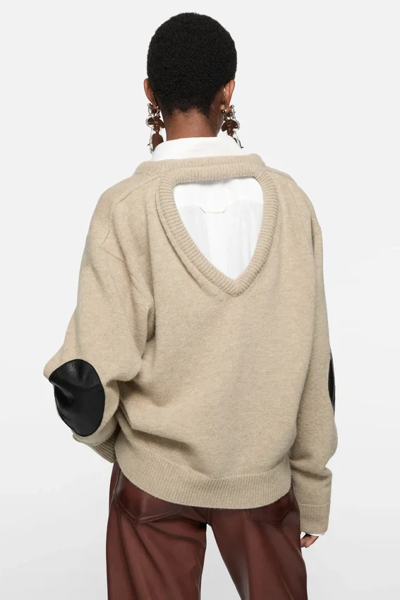 Wool sweater with cut-out